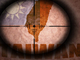 sniper scope aimed at the vintage taiwan flag and map