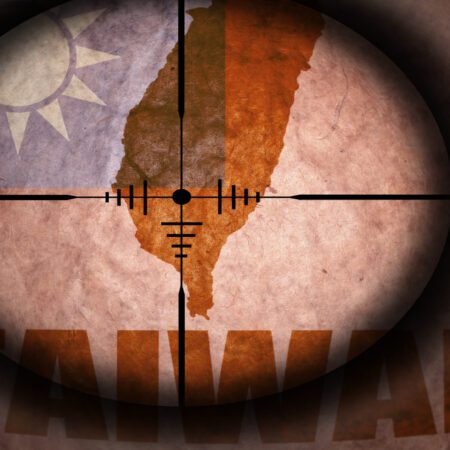 sniper scope aimed at the vintage taiwan flag and map