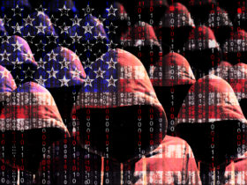 Group of hooded men shining through a digital american flag